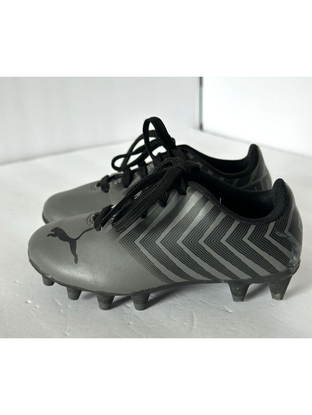 Youth Puma Cleats, Gray/Black trim, size 12, Unisex